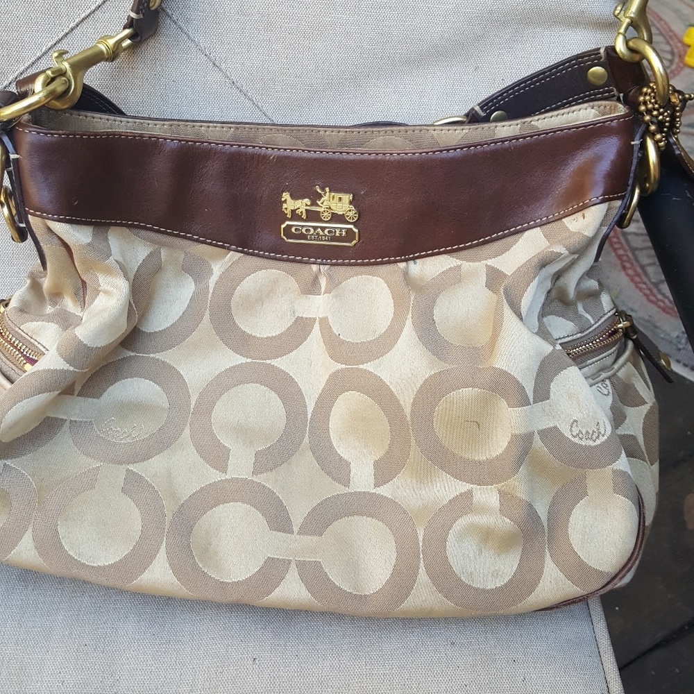Gently used, light tan coach shoulder bag